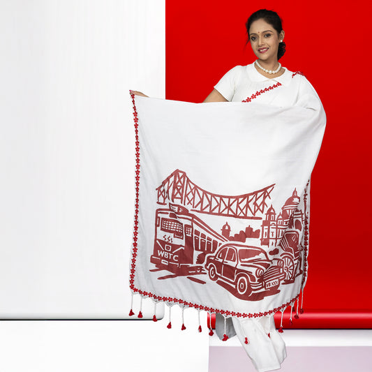 Kolkata Heritage Saree - Printed Cotton with Howrah Bridge and Tram design, featuring iconic cityscape in red on white cotton fabric.