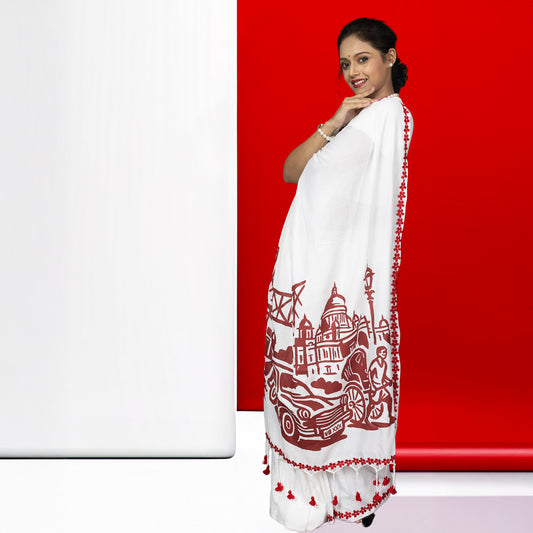 Amar Kolkata cotton saree with heritage print of tram, Howrah Bridge, and Victoria Memorial, ideal for festive and cultural wear.