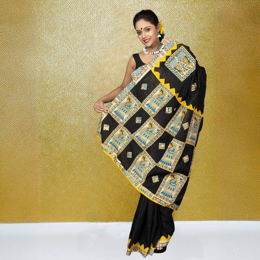 Heritage Appliqué Saree in black cotton with vibrant Bengali motifs and yellow borders, showcasing traditional craftsmanship for festive wear.