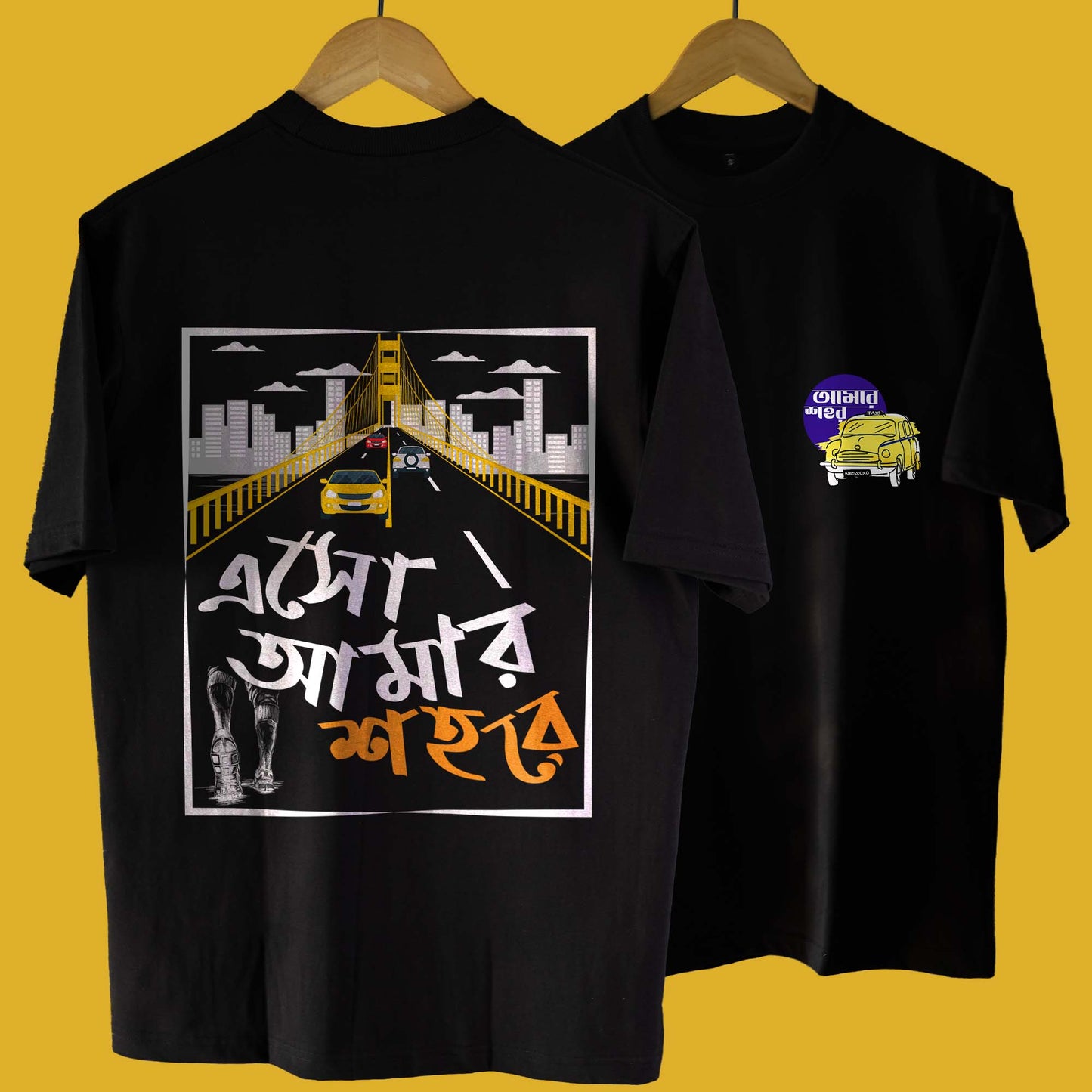 Eso Amar Shohore Kolkata T-Shirt in oversized unisex fit, featuring vibrant Kolkata city graphics with iconic landmarks and Bengali typography.