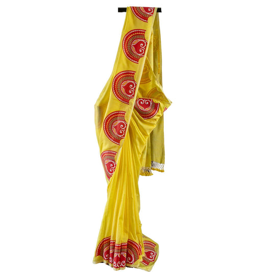 Sringer yellow khadi cotton saree with red circular Patachitra prints, perfect for traditional and festive occasions.