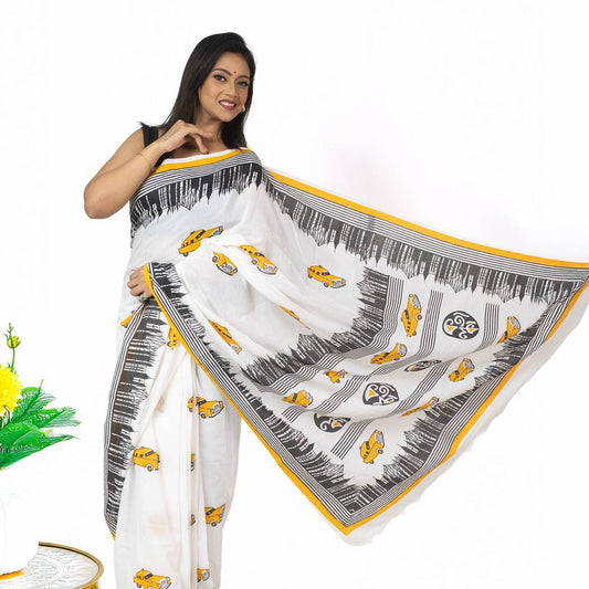 Kolkata Theme Cotton Saree in white with yellow taxi motifs and black cityscape border, ideal for festive wear and Bengali cultural celebrations.