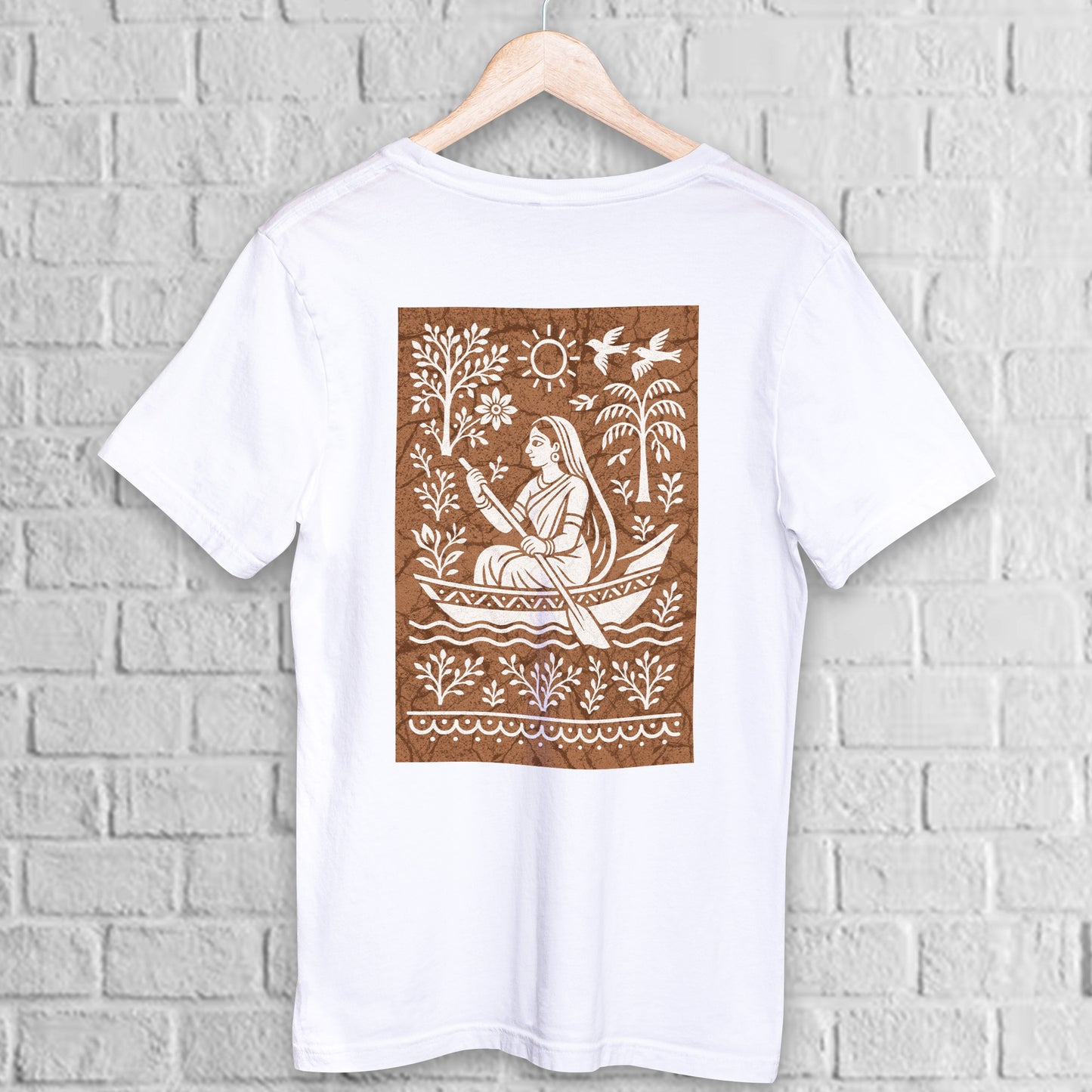 Bengali Boatwoman T-Shirt in batik folk art style printed on white premium cotton. Features a traditional boatwoman design with nature motifs.