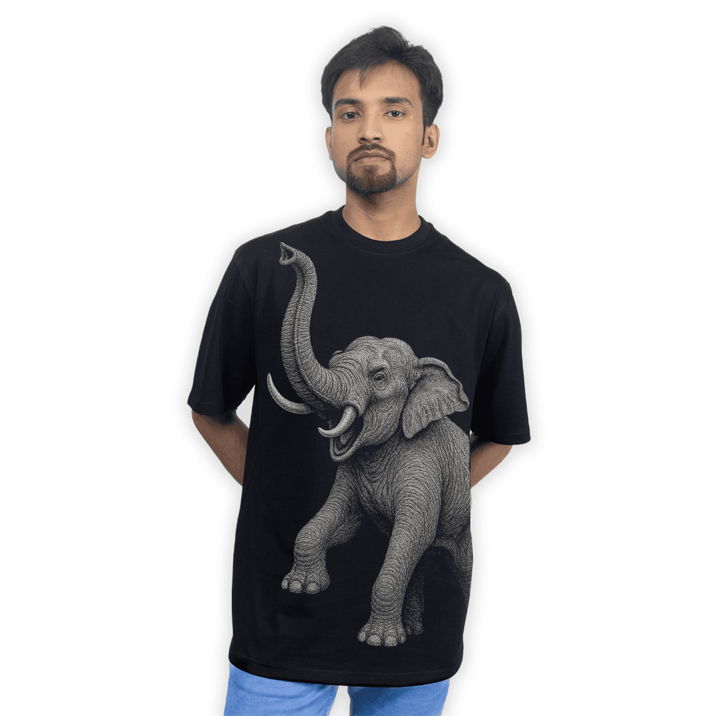 Model wearing the Indian Elephant Graphic T-Shirt with bold elephant artwork on the front. Relaxed unisex fit perfect for casual and artistic fashion.