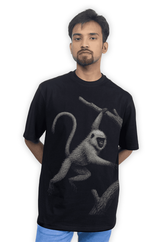 Model wearing Hanuman Langur T-Shirt - Animal T-Shirt | Wildlife design, Unisex styled in an oversized fit for casual streetwear appeal.