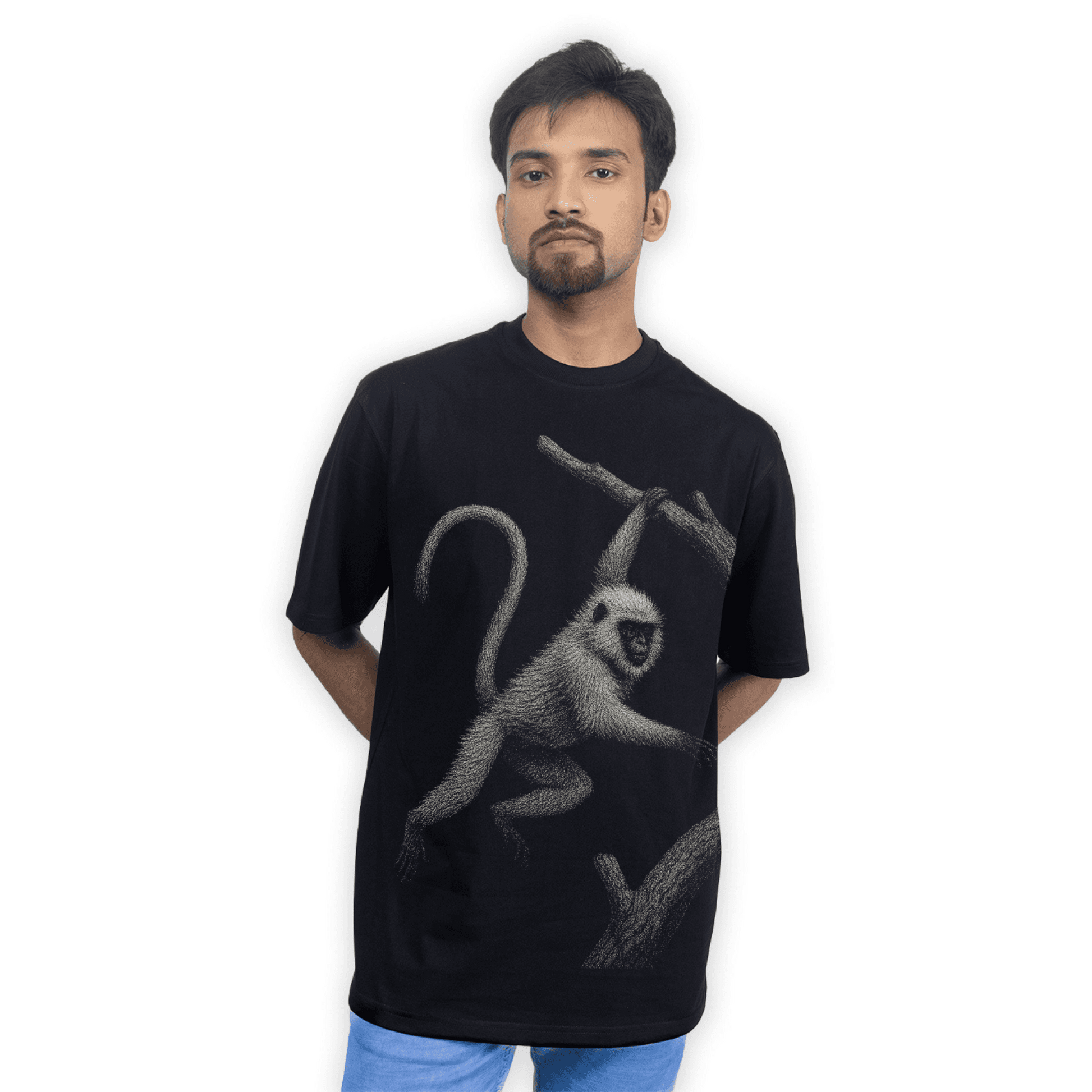 Model wearing Hanuman Langur T-Shirt - Animal T-Shirt | Wildlife design, Unisex styled in an oversized fit for casual streetwear appeal.