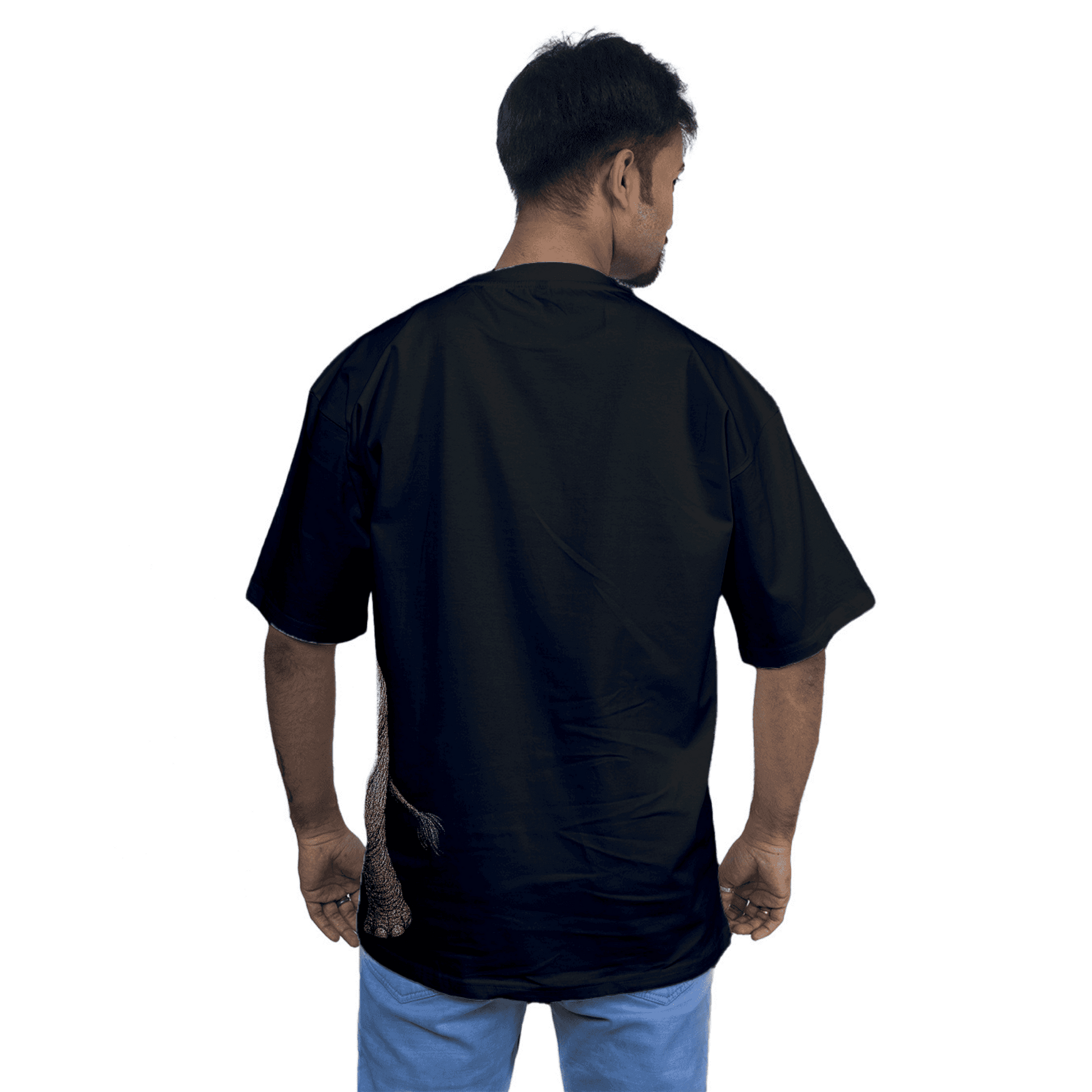 Rear view of model in Indian Elephant Graphic T-Shirt showing the oversized fit and partial elephant tail design on the back hem.