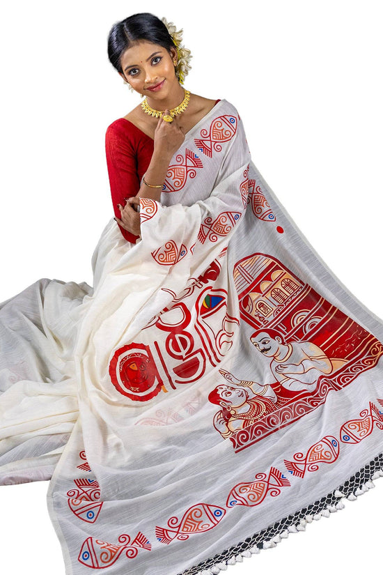 Model draped in 16 Ana Bangali Saree made of pure khadi cotton, highlighting vibrant red Bengali-themed prints and fish motifs.
