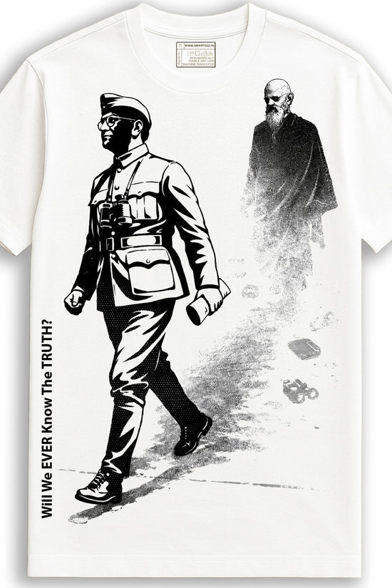 Will We Ever Know – Netaji T-shirt in white featuring bold black graphic of Subhas Chandra Bose and a fading monk, 100% cotton unisex fit.