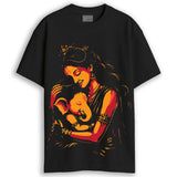 Man wearing Durga Puja t-shirt - Devi and Ganesha oversized black cotton tee with orange-red illustrated print