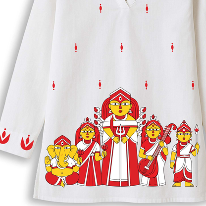 Close-up of the Maa Durga and family print in red and yellow Bengal Pattachitra style on the hem of a white cotton short kurti — Durga Puja 2026 women's wear