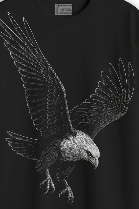 Close-up of Eagle Strike T-Shirt - Eagle tshirt | Oversized, unisex, streetwear showing detailed white eagle graphic on black cotton fabric.