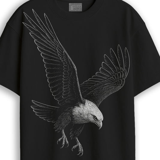 Close-up of Eagle Strike T-Shirt - Eagle tshirt | Oversized, unisex, streetwear showing detailed white eagle graphic on black cotton fabric.