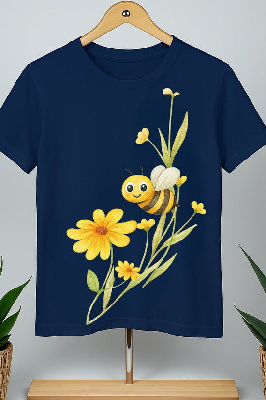 Bloom & Bumblebee blue cotton t-shirt with cheerful bumblebee and yellow floral graphic. Unisex bio-washed cotton tee for casual wear.