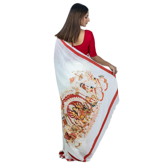 Back view of the Bonedi Barir Durga Puja khadi saree with the full pallu print visible: Durga and family idol, dhaki with drum, aarti figures and rust-and-ochre courtyard details inside a solid vermilion border