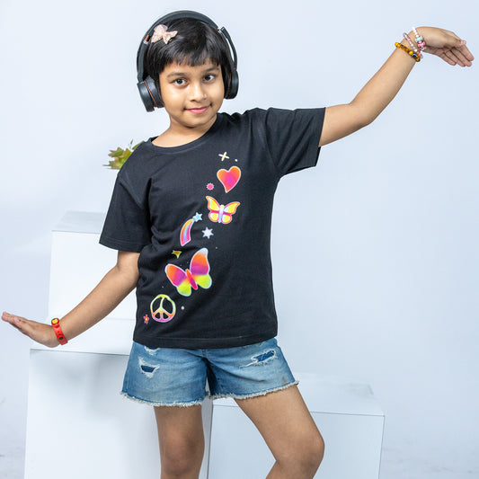 Butterfly printed T-shirt for girls in black, featuring colorful butterfly and heart graphics. Stylish and comfortable cotton tee for kids' fashion.