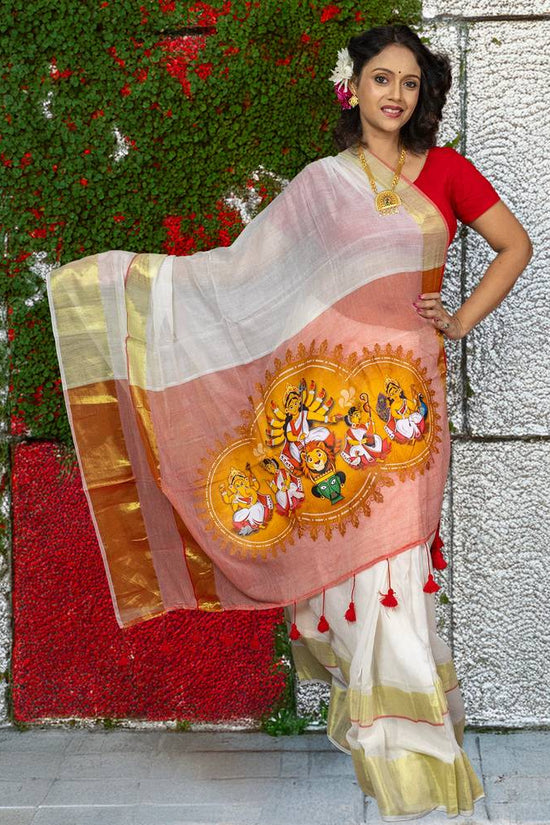 Chinmoyee Cotton Saree - Devi Durga design in vibrant hues, featuring heritage artwork on soft cotton ideal for festive and cultural wear.
