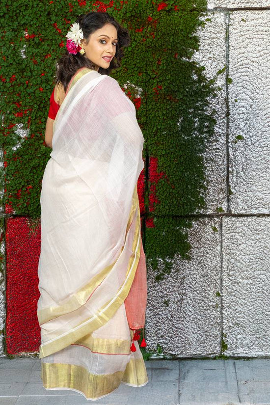 Back view of Chinmoyee Cotton Saree - Devi Durga, highlighting soft white cotton with gold border, ideal for traditional celebrations.