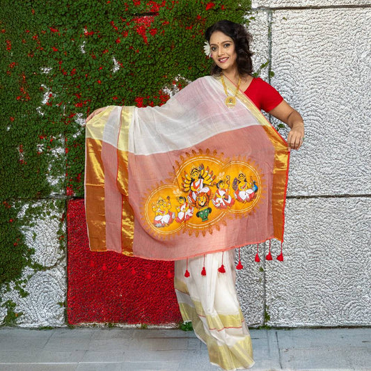 Chinmoyee Cotton Saree with Devi Durga print, showcasing traditional motifs and gold borders, perfect for Durga Puja and ethnic occasions.