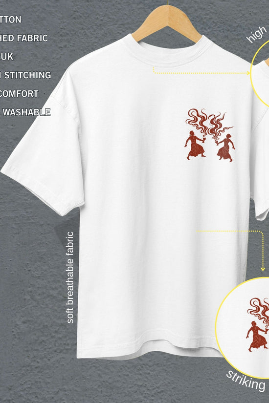 Dhunuchi Dance Tee - Durga Puja T Shirt in white with minimal folk design of dancers, oversized unisex fit, soft breathable cotton fabric.