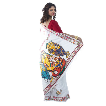 Durga Puja saree close-up showing Jamini Roy style folk art print of Maa Durga on khadi cotton pallu