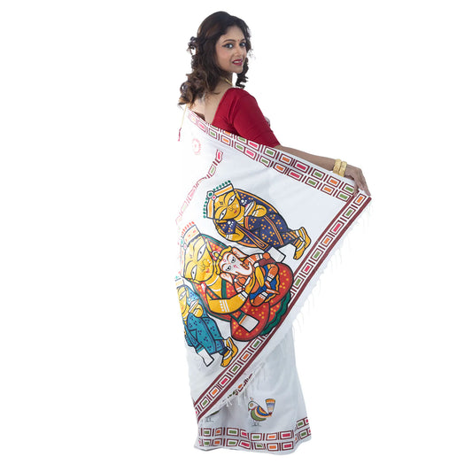 Durga Puja saree close-up showing Jamini Roy style folk art print of Maa Durga on khadi cotton pallu