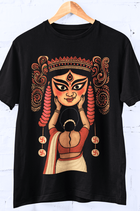 Durga Puja T-shirt design featuring a woman performing Boron ritual in vibrant Bengali folk-art style on black cotton fabric.