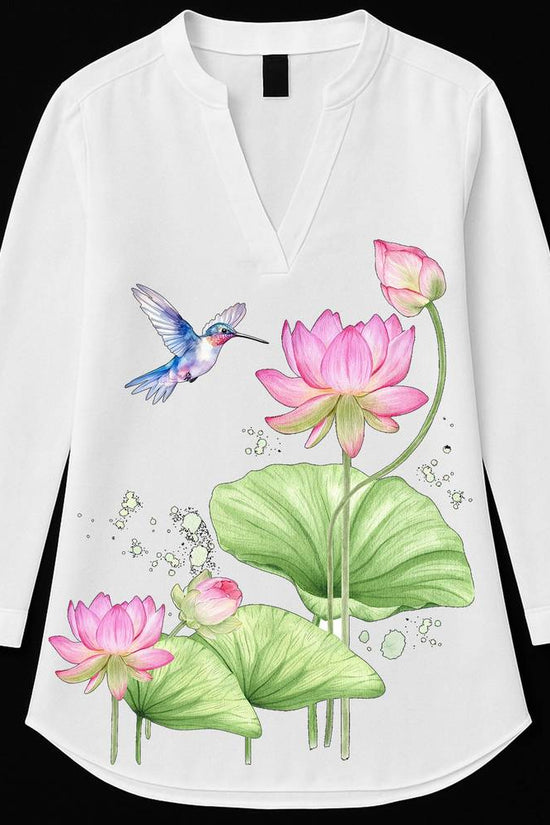 Floral Serenity Kurti featuring lotus and bird print on white cotton fabric with V-neck and three-quarter sleeves. Ideal for elegant casual wear.