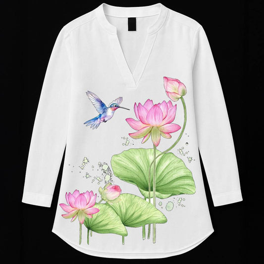 Floral Serenity Kurti featuring lotus and bird print on white cotton fabric with V-neck and three-quarter sleeves. Ideal for elegant casual wear.