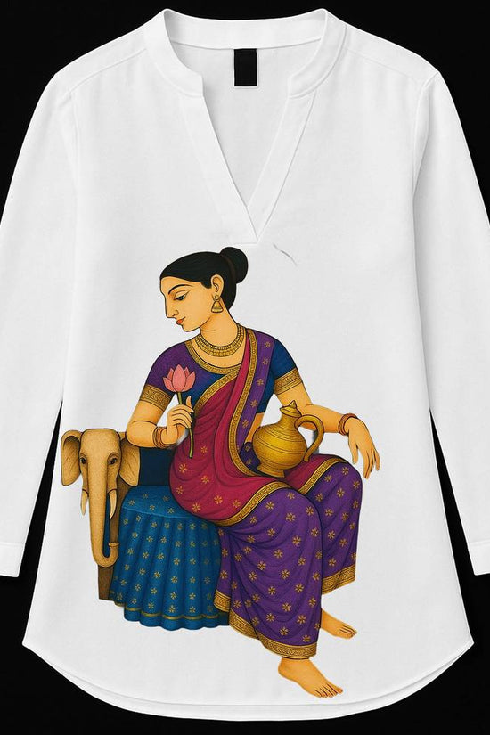 Gaja Lakshmi Kurti in Jamini Roy folk art style featuring Goddess Lakshmi with lotus and kalash, on white tunic top. Bengal heritage apparel.