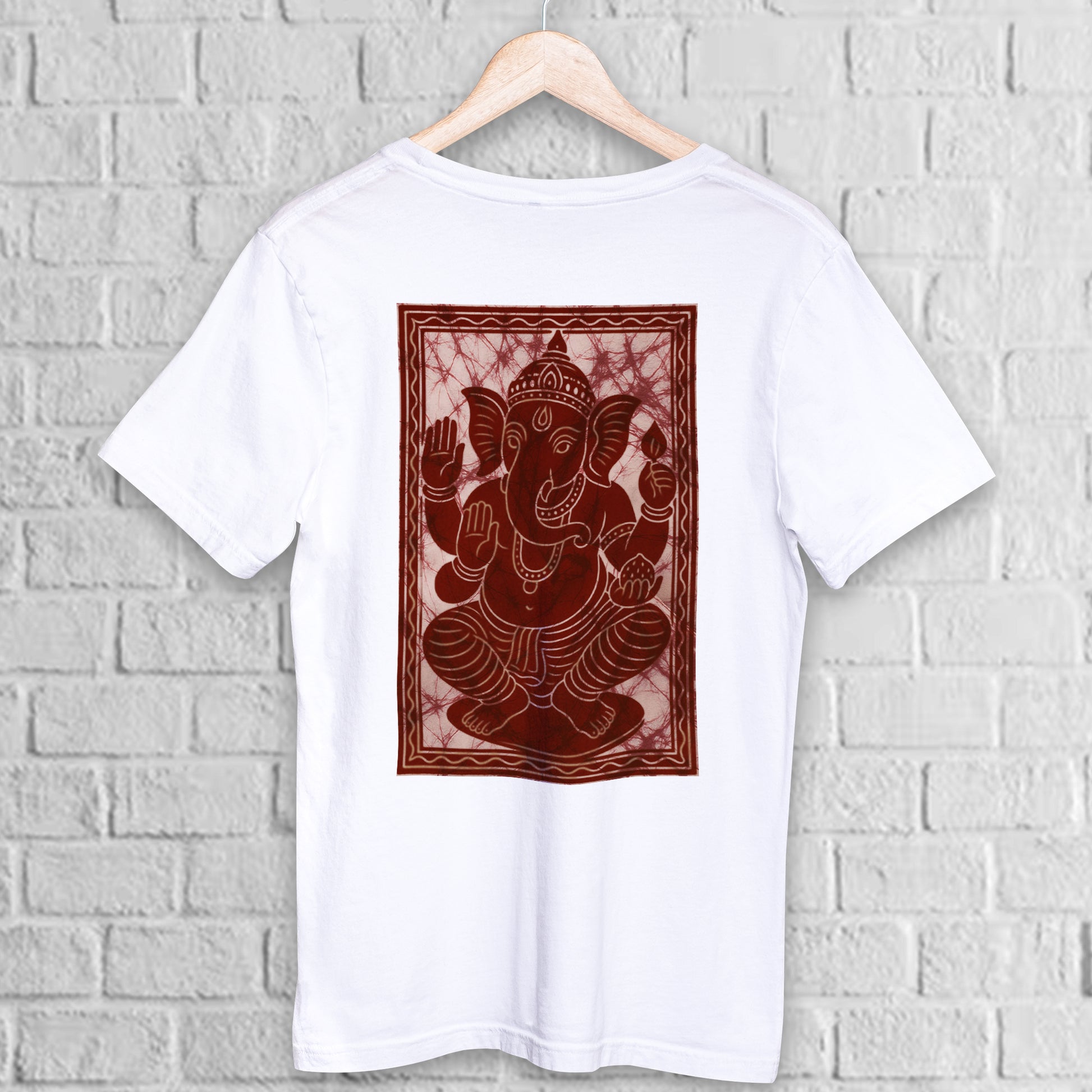 Lord Ganesha T-Shirt in Batik style featuring a detailed maroon print on white cotton fabric. Unisex spiritual wear ideal for cultural events.