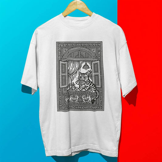 Ghorer Bagh Cat Art T-Shirt - Unisex Bengali Style featuring black heritage cat illustration in window frame on oversized white tee.