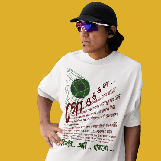 Model wearing Goal oversized unisex Bengali T-shirt with Mohun Bagan design.