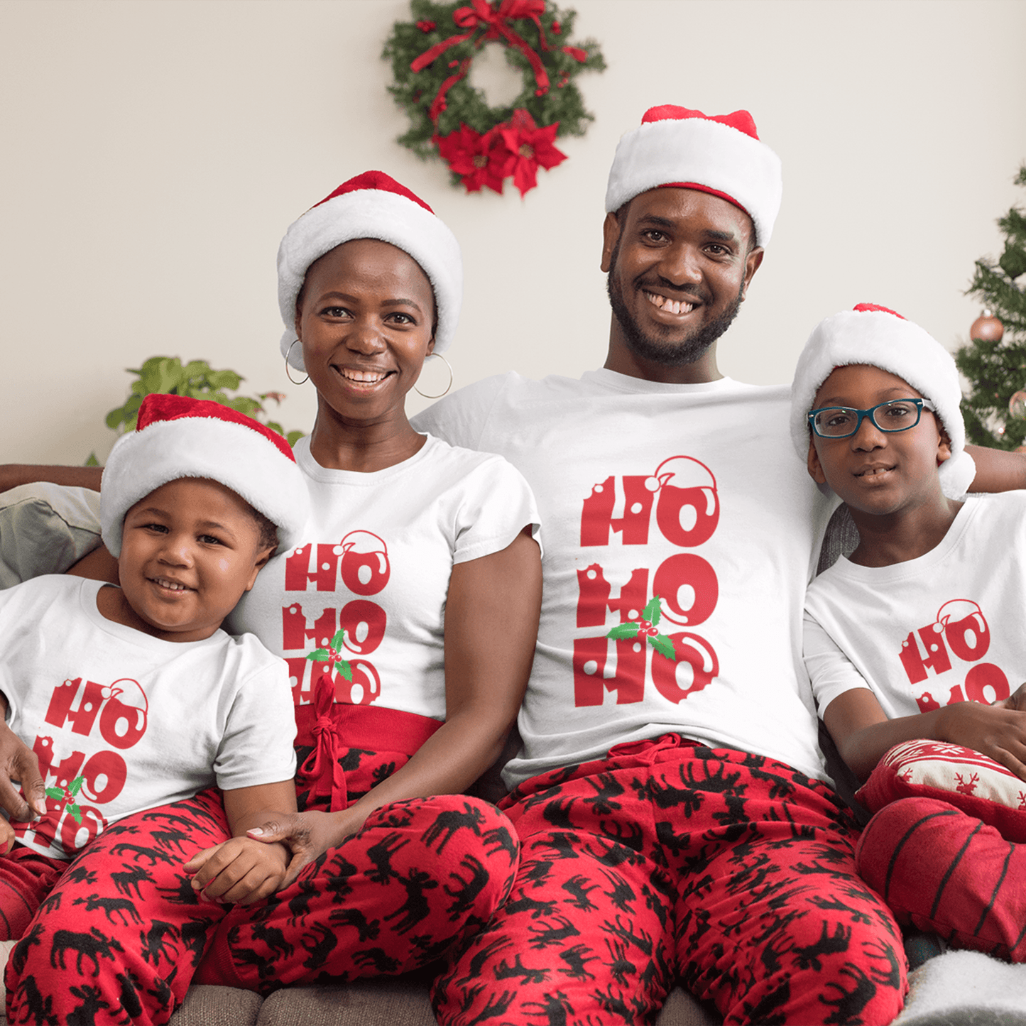 "Ho Ho Ho Christmas T-shirt by Smarteez – Fun and festive design perfect for family Christmas shirts and spreading holiday cheer."