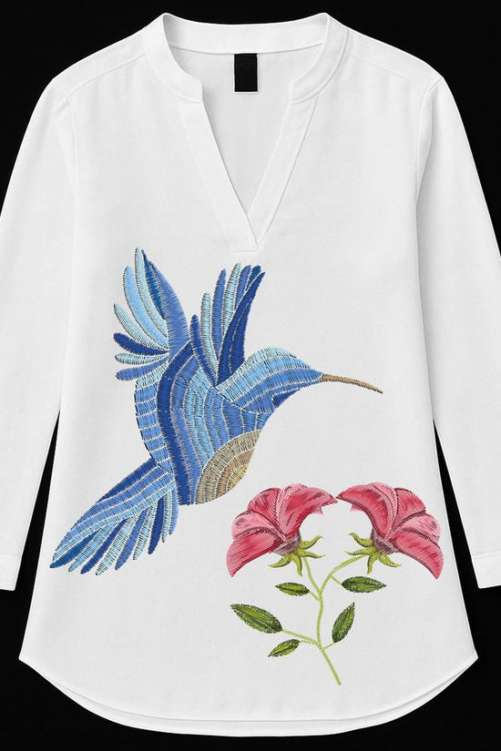 Hummingbird Harmony - Printed Kurti Women features a white tunic with a vibrant blue hummingbird and pink floral print. Ideal for casual elegance and comfort.
