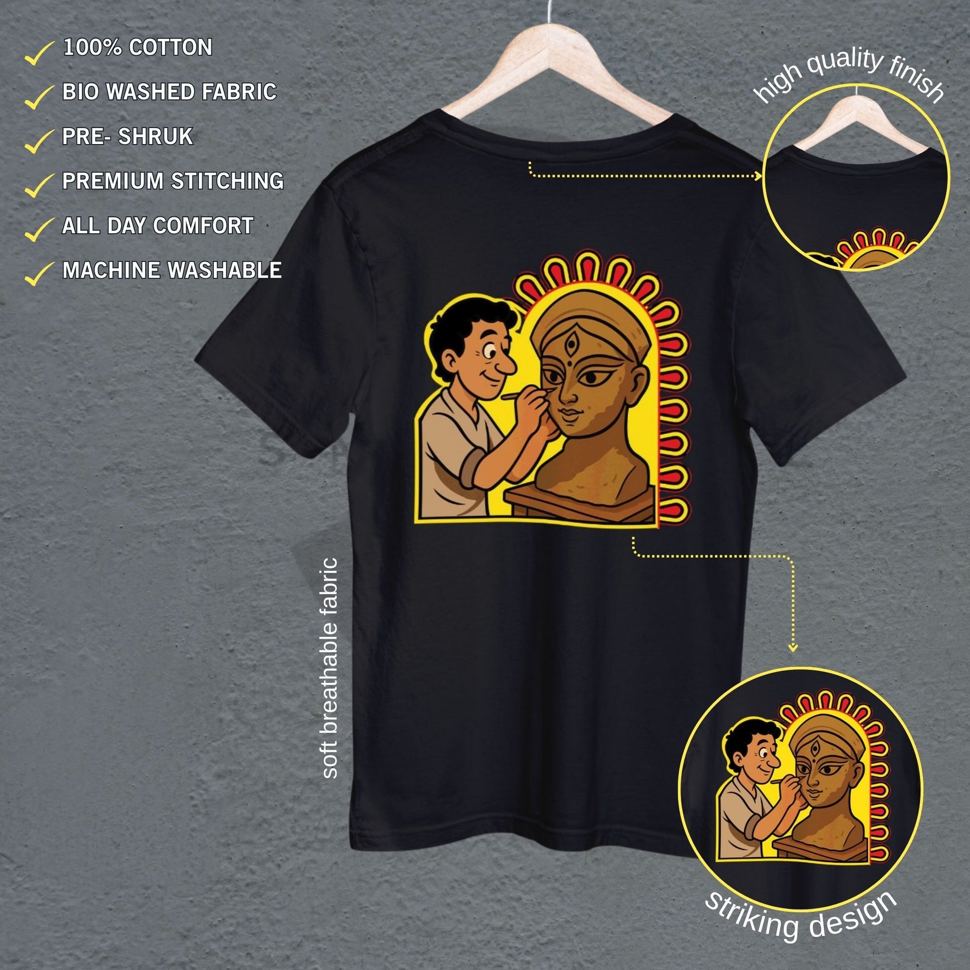 Durga Puja T-Shirt featuring cartoon-style idol maker sculpting Goddess Durga, printed on black premium cotton with vibrant traditional artwork.