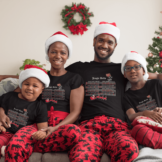 Family wearing matching 'Jingle Bells' Christmas T-shirts, celebrating together.