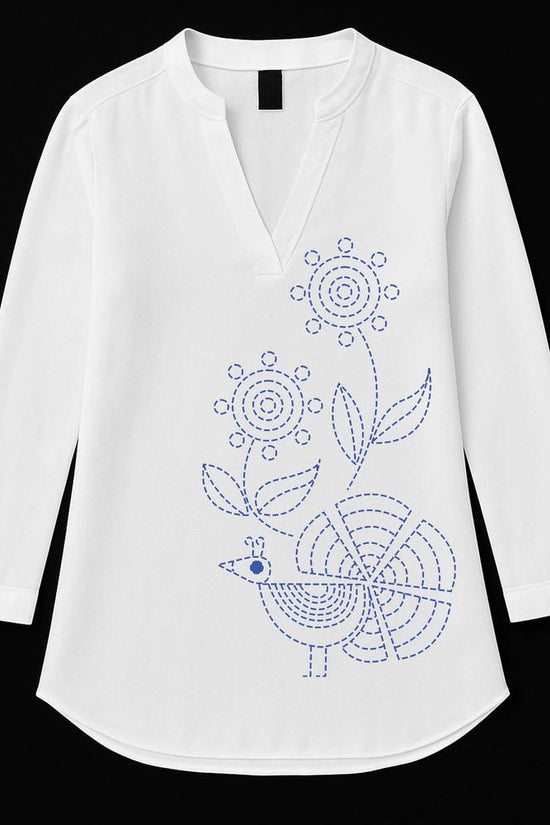 Bengali Heritage Kurti with blue Kantha stitch bird and floral motif on white fabric. Elegant tunic top for women in traditional embroidery style.