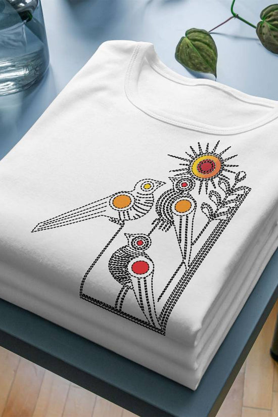 Bird T-Shirt - Kantha Stitch design featuring colorful Bengali folk art birds printed on folded white unisex cotton tee. Ideal for cultural fashion lovers.