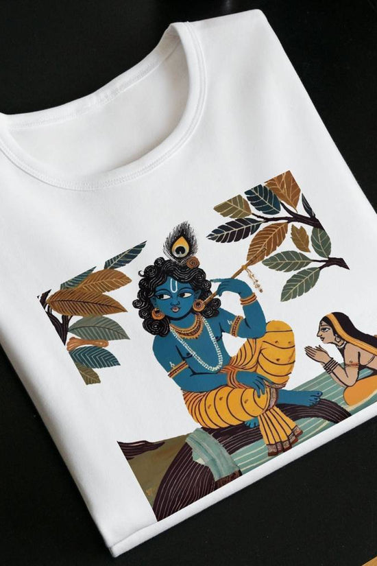 Krishna & Gopini graphic T-shirt featuring Indian folk art on soft cotton fabric. Inspired by Jamini Roy, this cultural tee blends tradition with style.