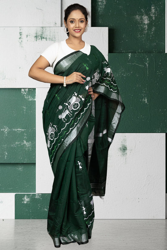 Front view of Kumorparar Gorur Gari Bengali cotton saree featuring traditional bullock cart motifs and a soft, breathable cotton drape.