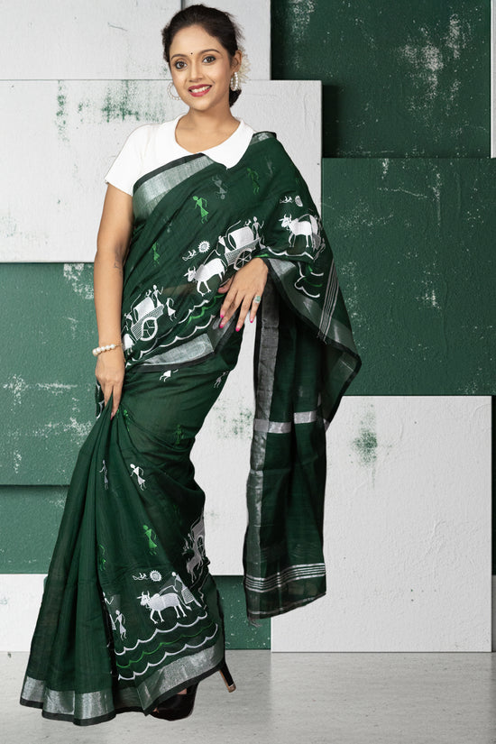 Model wearing heritage green Kumorparar Gorur Gari saree with white gorur gari patterns, blending Bengali tradition with modern comfort.
