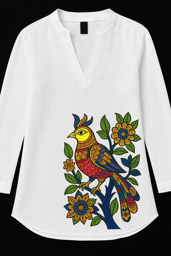 Moina Pakhi – Folk Art Inspired Printed Kurti for Women featuring vibrant Bengal bird motifs and floral patterns on a white tunic top. Ideal for festive wear.