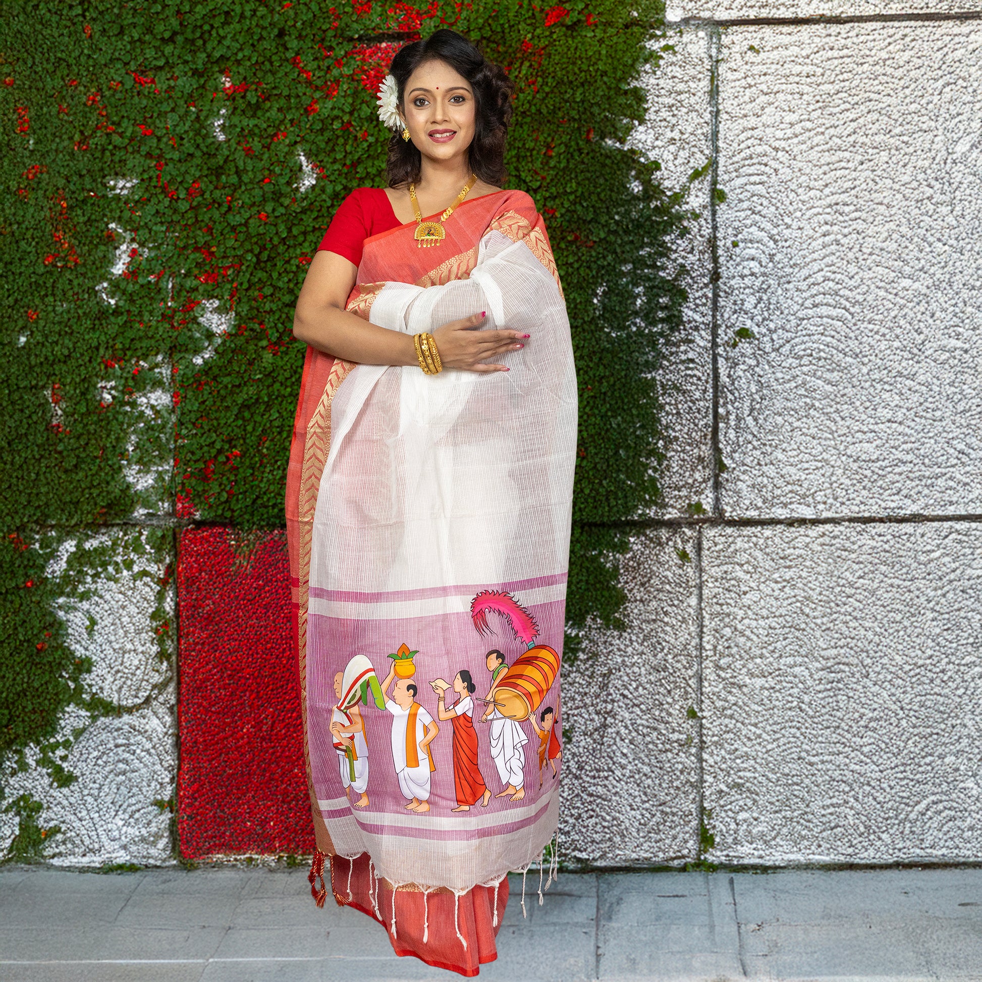 Elegant cotton saree with Durga Puja themed print, highlighting Bengali rituals in a festive red and white traditional design.