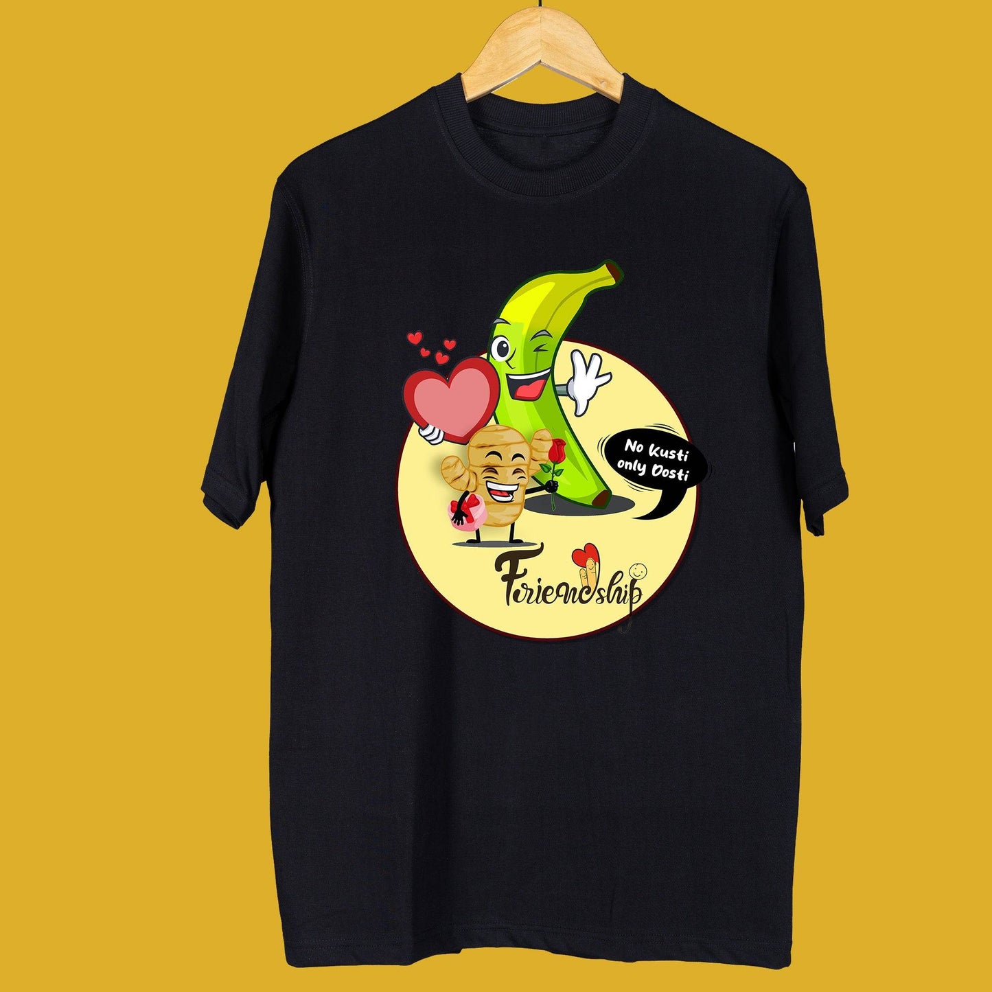 Black oversized unisex t-shirt with a colorful 'No Kusti - Only Dosti' graphic print, hanging on a wooden hanger.