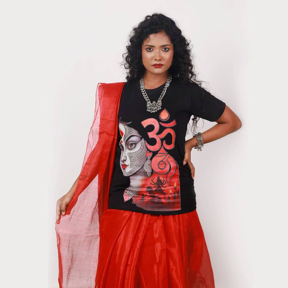 Om Shakti Durga Puja T-Shirt – Divine Art | Unisex, Regular Fit featuring Maa Durga face graphic with Om symbol in red and black tones. Ideal for festive wear.