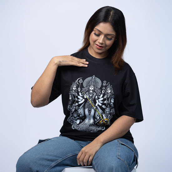 Black oversized unisex T-shirt featuring a detailed Bengali spiritual design of Goddess Durga. Made from premium bio-washed cotton for comfort and style.