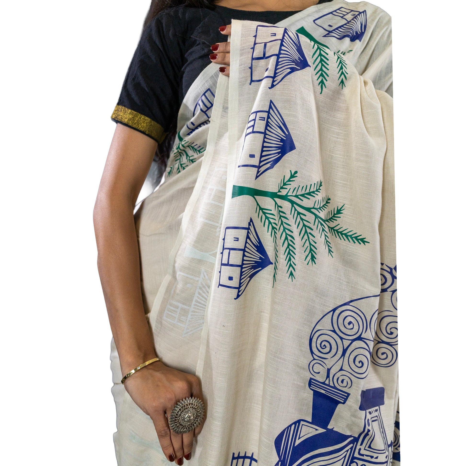 Pather Panchali Saree - Pure Khadi Cotton close-up of intricate blue house and green palm motifs, hand-printed on soft beige cotton.