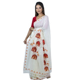 Smarteez Pujo Scroll saree in white khadi cotton, front view with the pallu showing a column of maroon arched panels depicting dhaki, anjali, dhunuchi naach and sindoor khela with lotus motifs and tassel edge