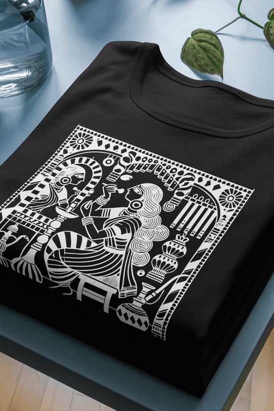 'Sayam-Sringar' Kalighat Patachitra T-Shirt featuring intricate Bengali folk art in white on black 180 GSM cotton fabric. Stylish, comfortable, and machine washable.